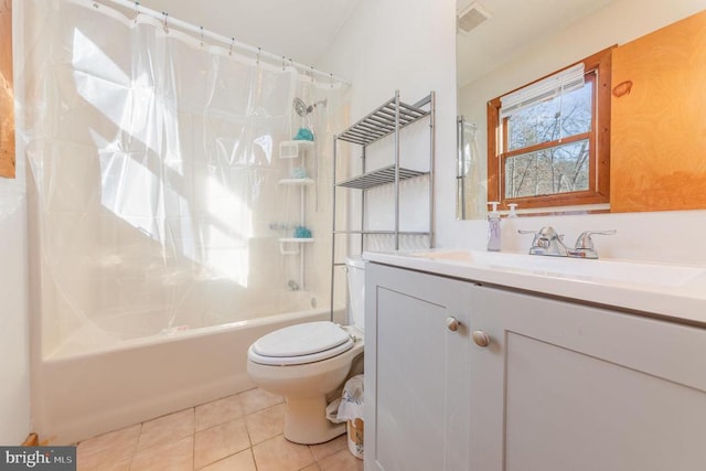 full bathroom with tile patterned flooring, vanity, toilet, and shower / bath combo with shower curtain