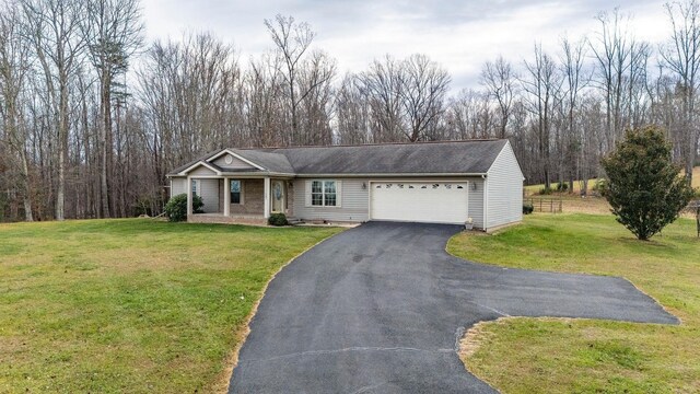 view of front facade featuring a garage and a front yard