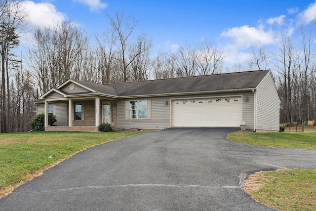 ranch-style home with a garage and a front yard