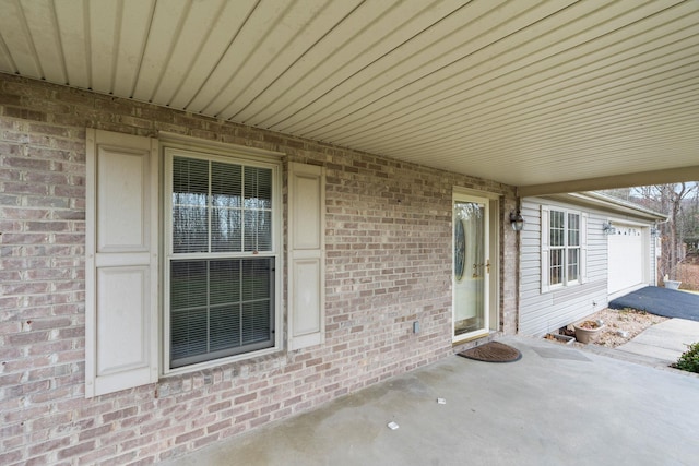 view of patio with a garage