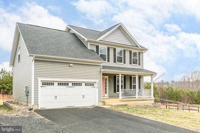 view of front facade with driveway, a garage, a shingled roof, fence, and a porch