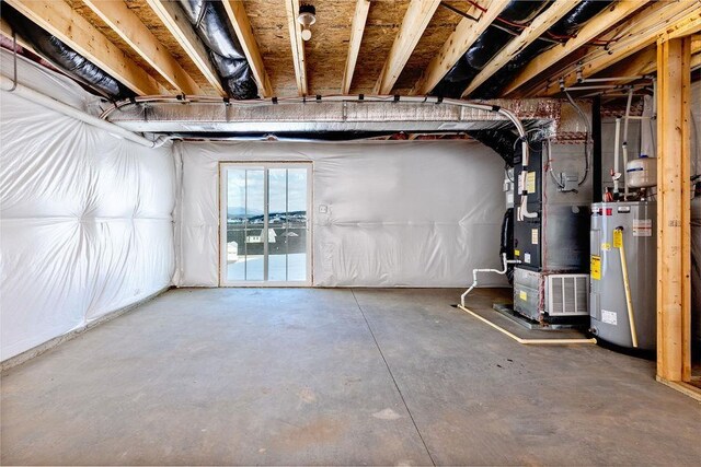 basement featuring electric water heater and heating unit