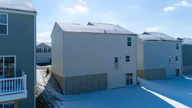 view of snow covered house