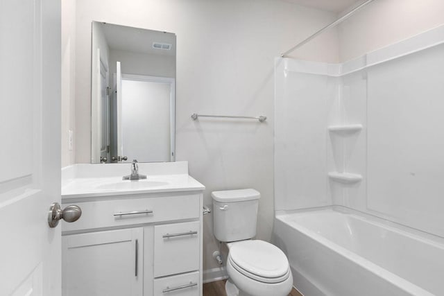 full bathroom featuring vanity, bathing tub / shower combination, and toilet