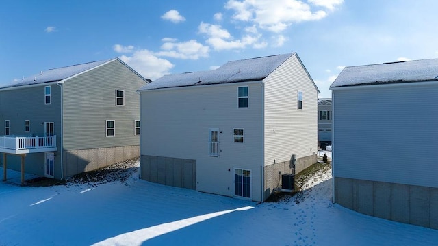 view of snow covered house