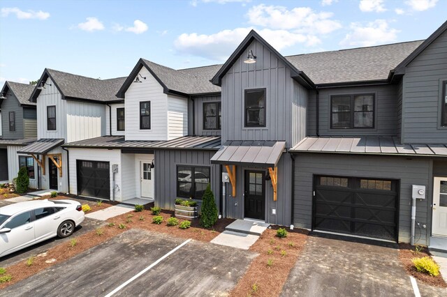 view of front of home with board and batten siding, a standing seam roof, and metal roof