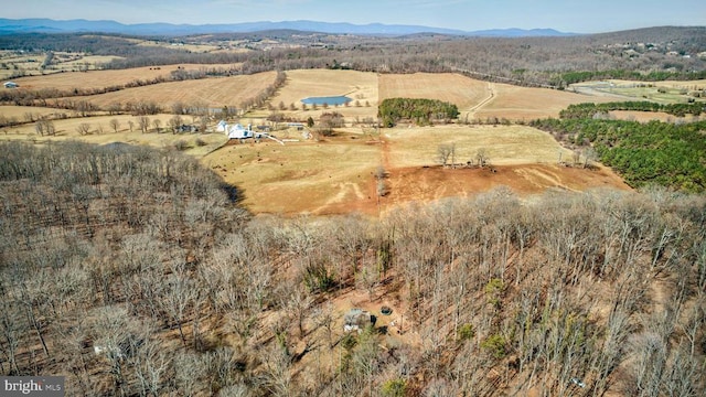 bird's eye view featuring a rural view and a mountain view