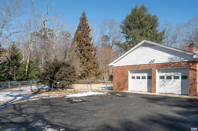 view of snow covered garage