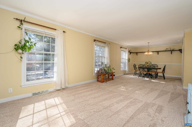 interior space with crown molding and carpet floors