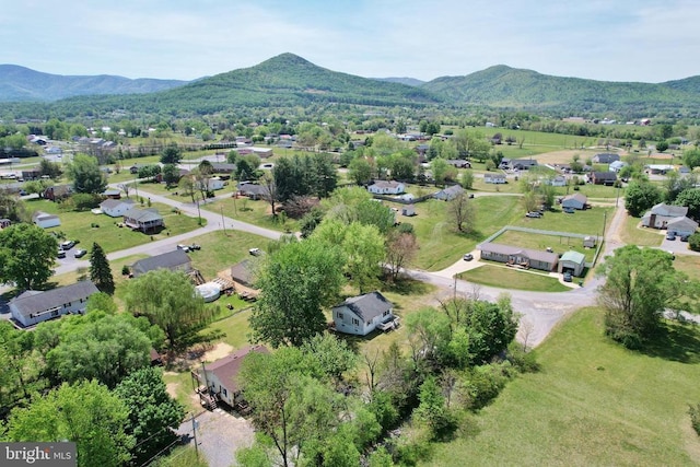 drone / aerial view with a residential view and a mountain view