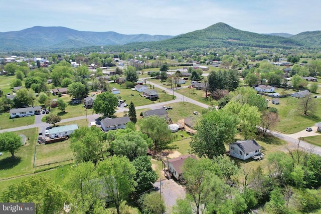 birds eye view of property with a residential view and a mountain view