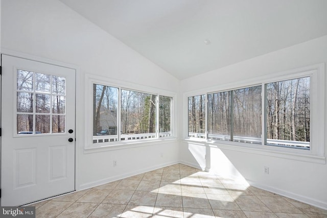 unfurnished sunroom with lofted ceiling