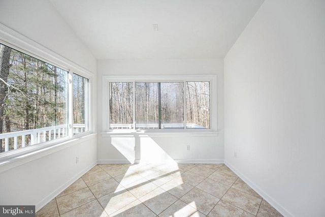 unfurnished sunroom with vaulted ceiling