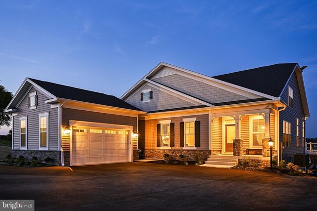 craftsman-style house featuring a garage