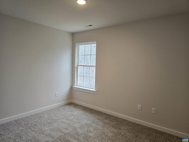 view of carpeted spare room