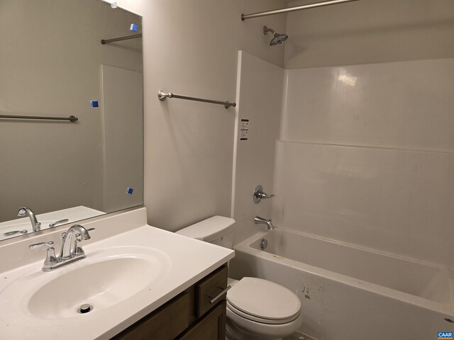 full bathroom featuring vanity, toilet, and bathing tub / shower combination