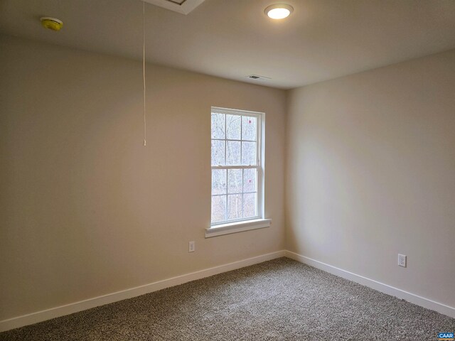 view of carpeted spare room