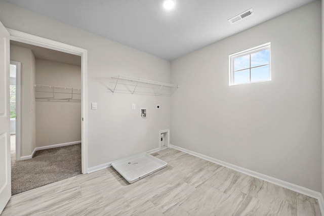 laundry area featuring hookup for a washing machine, baseboards, visible vents, laundry area, and electric dryer hookup