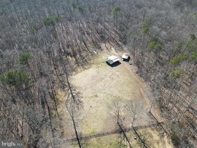 aerial view featuring a forest view