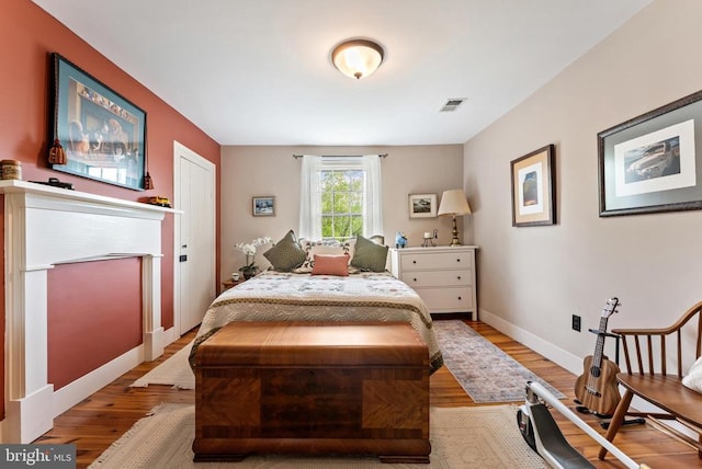 bedroom featuring light hardwood / wood-style flooring