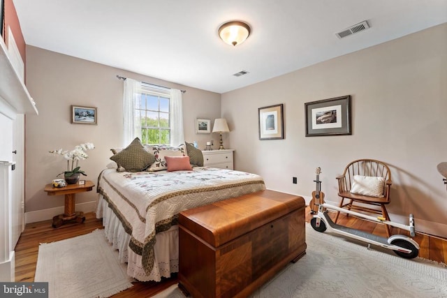 bedroom with light hardwood / wood-style floors