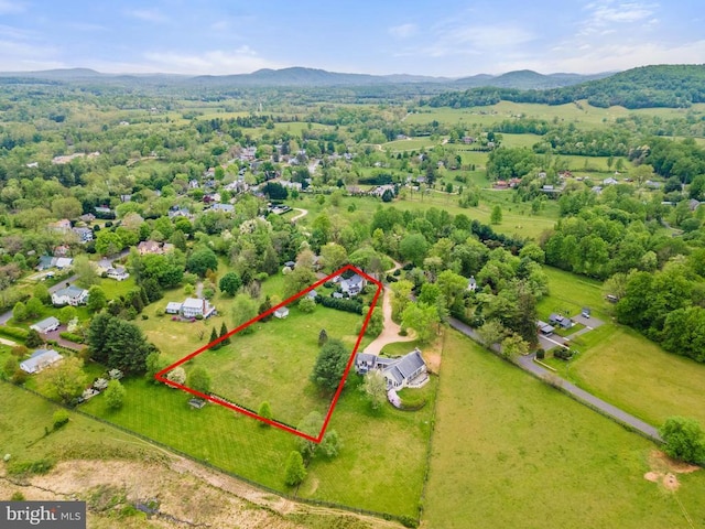 drone / aerial view featuring a mountain view