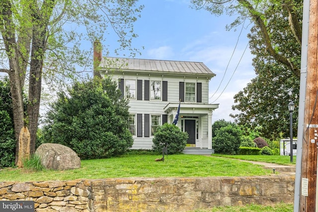 view of front of home with a front yard