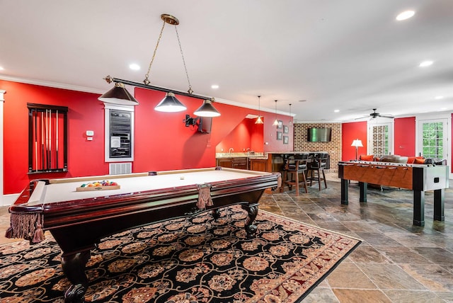 game room with crown molding, billiards, ceiling fan, and bar area