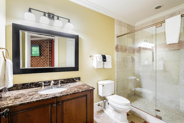 bathroom featuring ornamental molding, toilet, vanity, and walk in shower