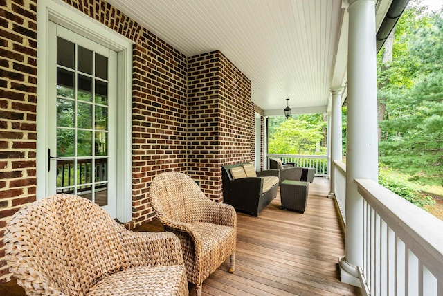 wooden terrace with a porch