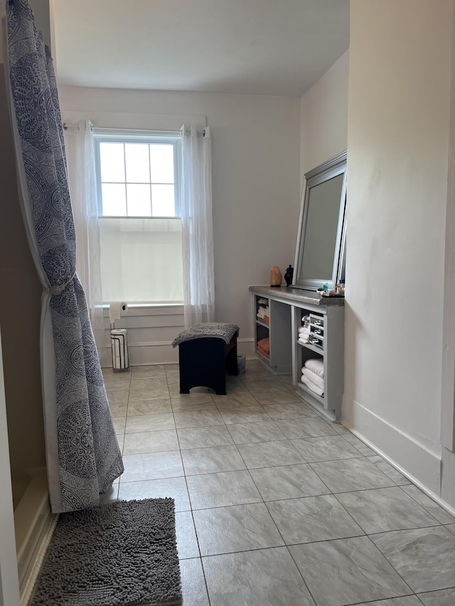 bathroom featuring tile patterned flooring