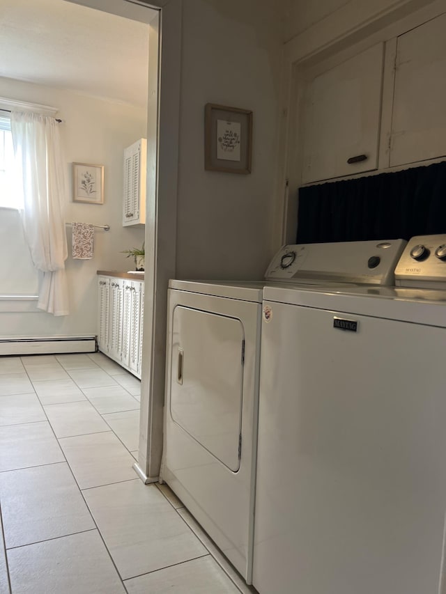 laundry room with a baseboard radiator, independent washer and dryer, and light tile patterned flooring