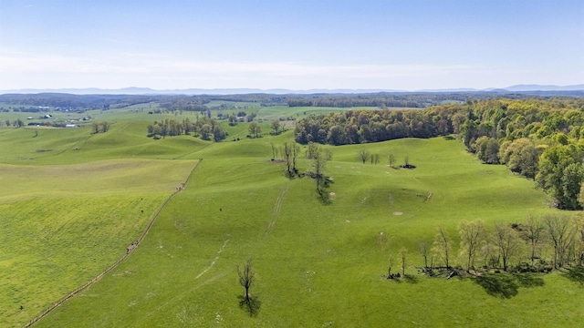 bird's eye view with a mountain view and a rural view