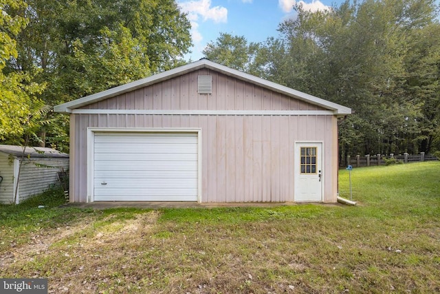 garage with a lawn