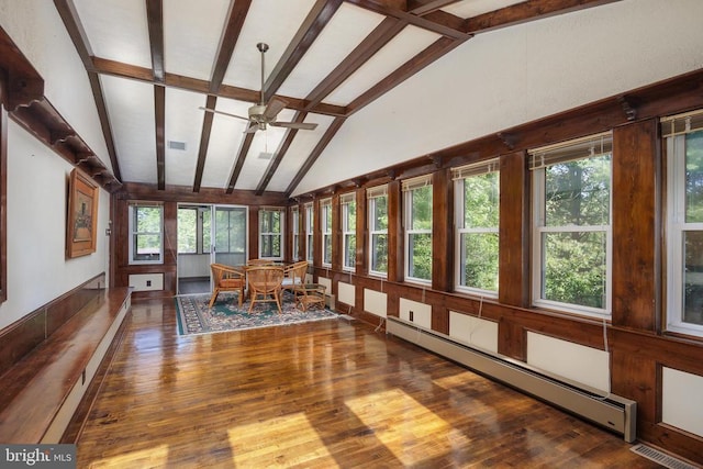 unfurnished sunroom featuring ceiling fan, a baseboard radiator, and vaulted ceiling with beams