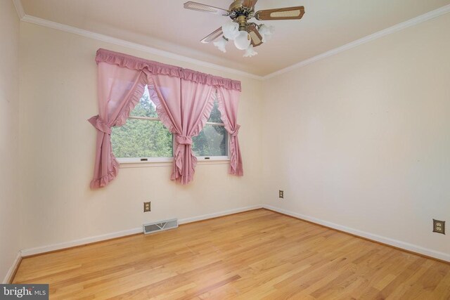 unfurnished room featuring crown molding, ceiling fan, and light hardwood / wood-style floors