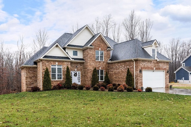 view of front of house with a garage and a front lawn