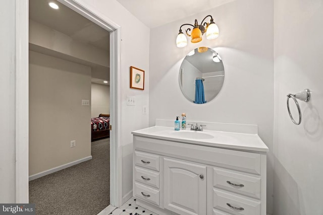 bathroom featuring vanity and baseboards