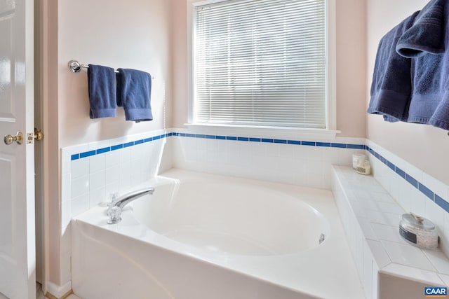 full bathroom featuring a garden tub