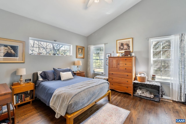 bedroom featuring ceiling fan, lofted ceiling, and wood finished floors