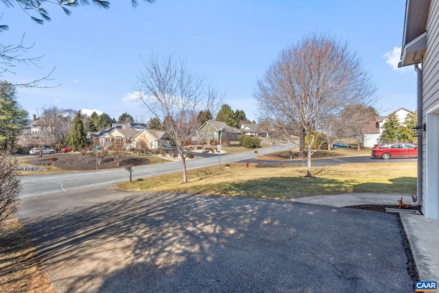 view of road featuring a residential view