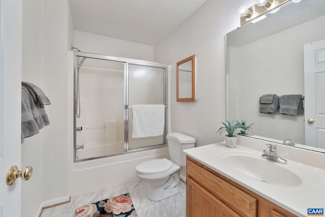 bathroom featuring shower / bath combination with glass door, toilet, and vanity