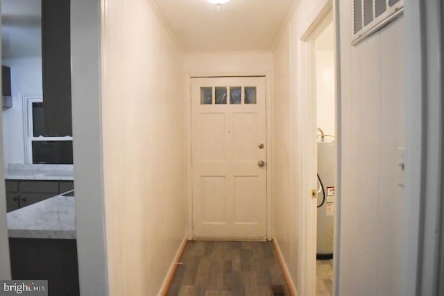 entryway with dark hardwood / wood-style flooring