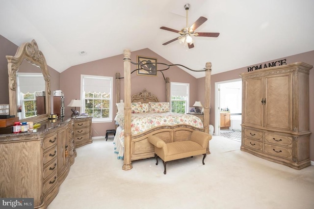 bedroom featuring multiple windows, light colored carpet, ceiling fan, and lofted ceiling