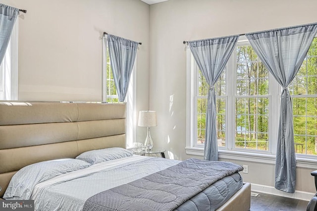 bedroom featuring baseboards