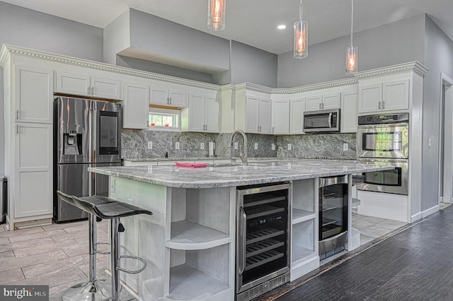 kitchen with backsplash, beverage cooler, a kitchen bar, stainless steel appliances, and open shelves