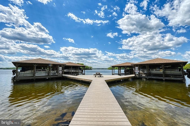 dock area featuring a water view and boat lift