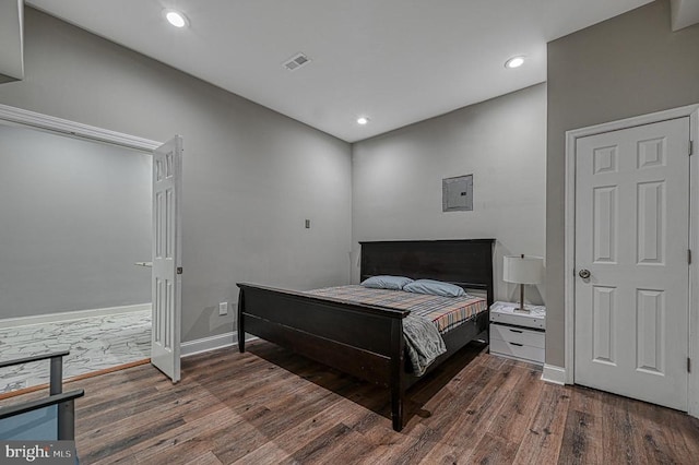 bedroom featuring recessed lighting, baseboards, and hardwood / wood-style floors