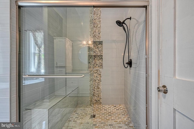 bathroom featuring a stall shower