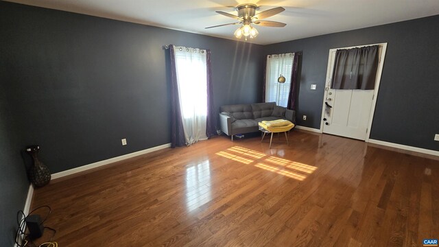 unfurnished room featuring ceiling fan and wood-type flooring